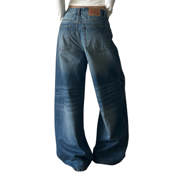 Faded Crackle Wash Baggy Curved Leg Denim Jeans