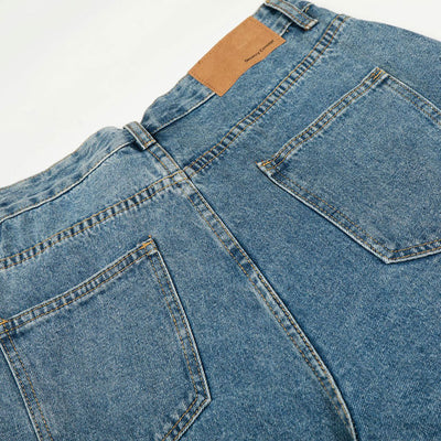 Asymmetrical Wide Leg Modern Light Wash Jeans