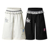 Y2K Polka Dot Graphic Ruffle Waist Baggy Wide-Leg Bermuda Denim Shorts