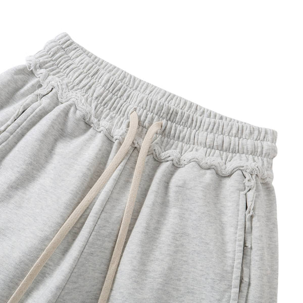Relaxed Raw Hem Puddle Pants