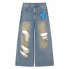 Distressed Barrel Leg Denim Jeans with Heavy Rip Details
