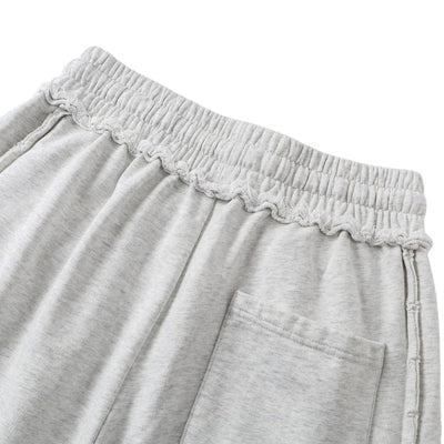 Relaxed Raw Hem Puddle Pants
