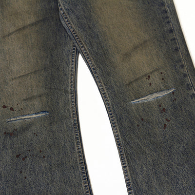 Vintage Wash Ripped Knee Loose Jeans